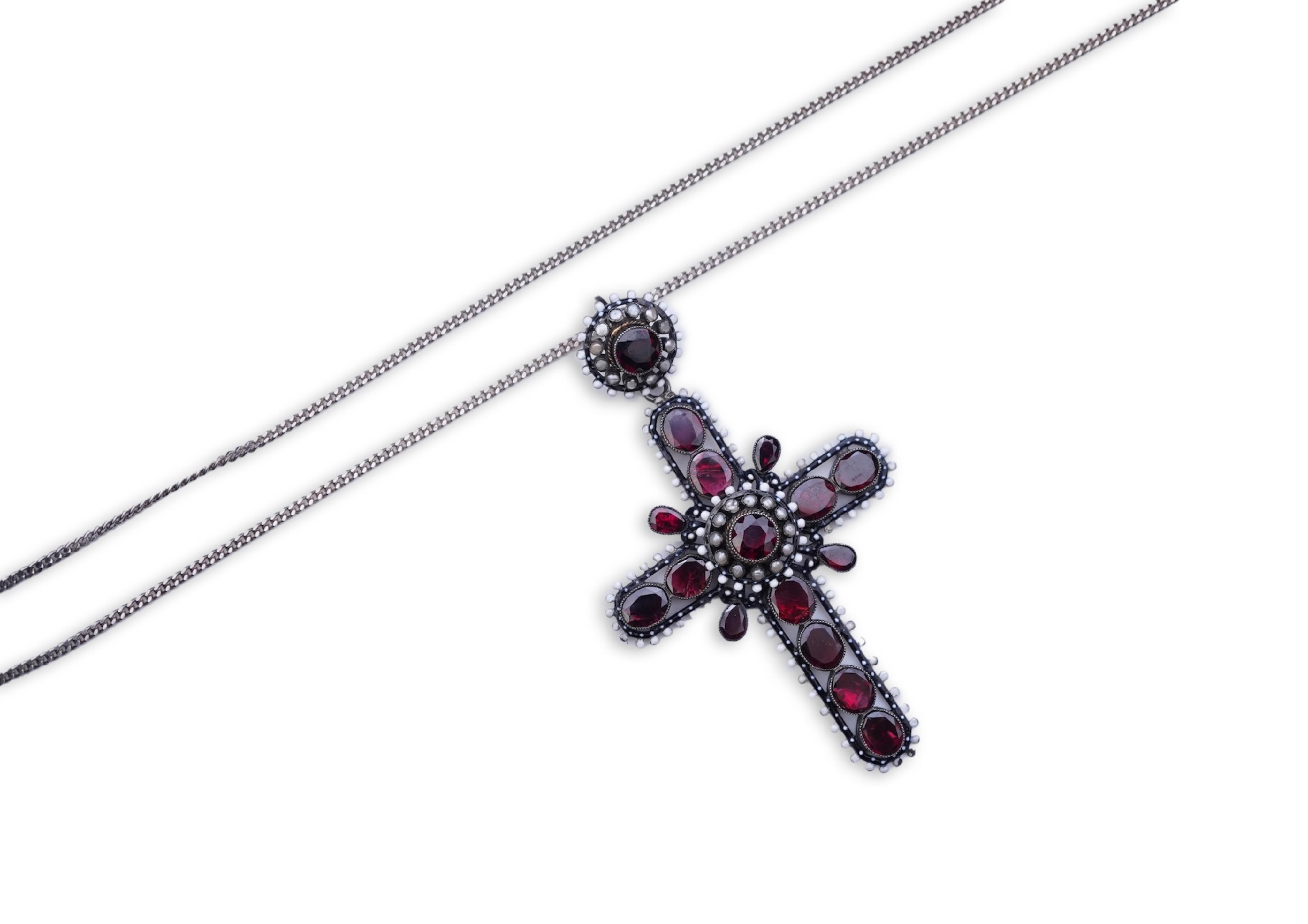 A Renaissance Revival enamel and garnet pendant, late 19th century